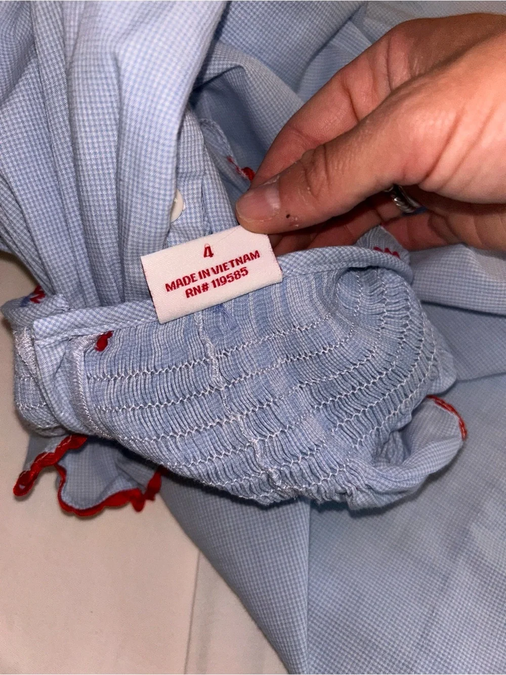 Girls' Light Blue Smocked Dress with Red Trim and Flag Embroidery